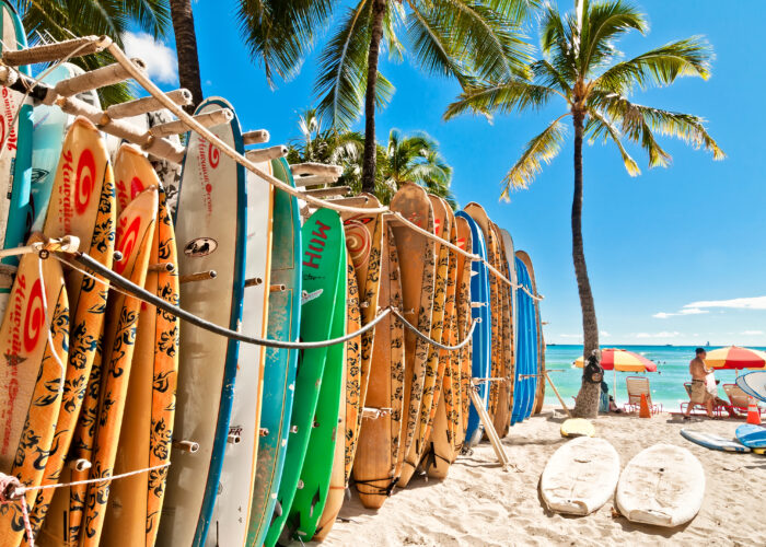 Surfboards lined up on the beach in Waikiki, Honolulu, Hawaii
